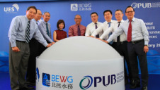 PUB chief executive Ng Joo Hee (left), and PUB chairman Tan Gee Paw (second from left), join colleagues in celebrating the opening of BEWG-UESH NEWater Plant